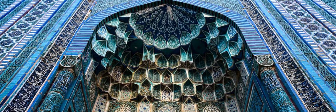 Detailed architectural tile work at Shah-i-Zinda in Samarkand, showcasing Islamic artistry.